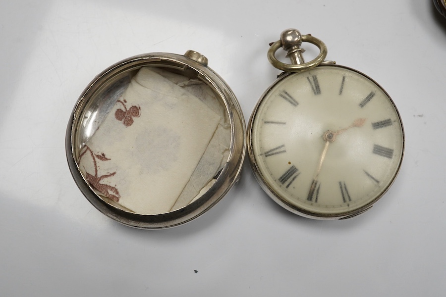 An early Victorian silver pair cased key wind verge pocket watch by Tho. Cogger, Hastings, outer case diameter 57mm, two other gilt metal pair cased pocket watches and a silver plated snuff box. Condition - poor